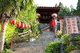 China: Path leading to guest houses overlooking Lijiang Old Town, Yunnan Province