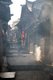 China: A smoky back street, Lijiang Old Town, Yunnan Province